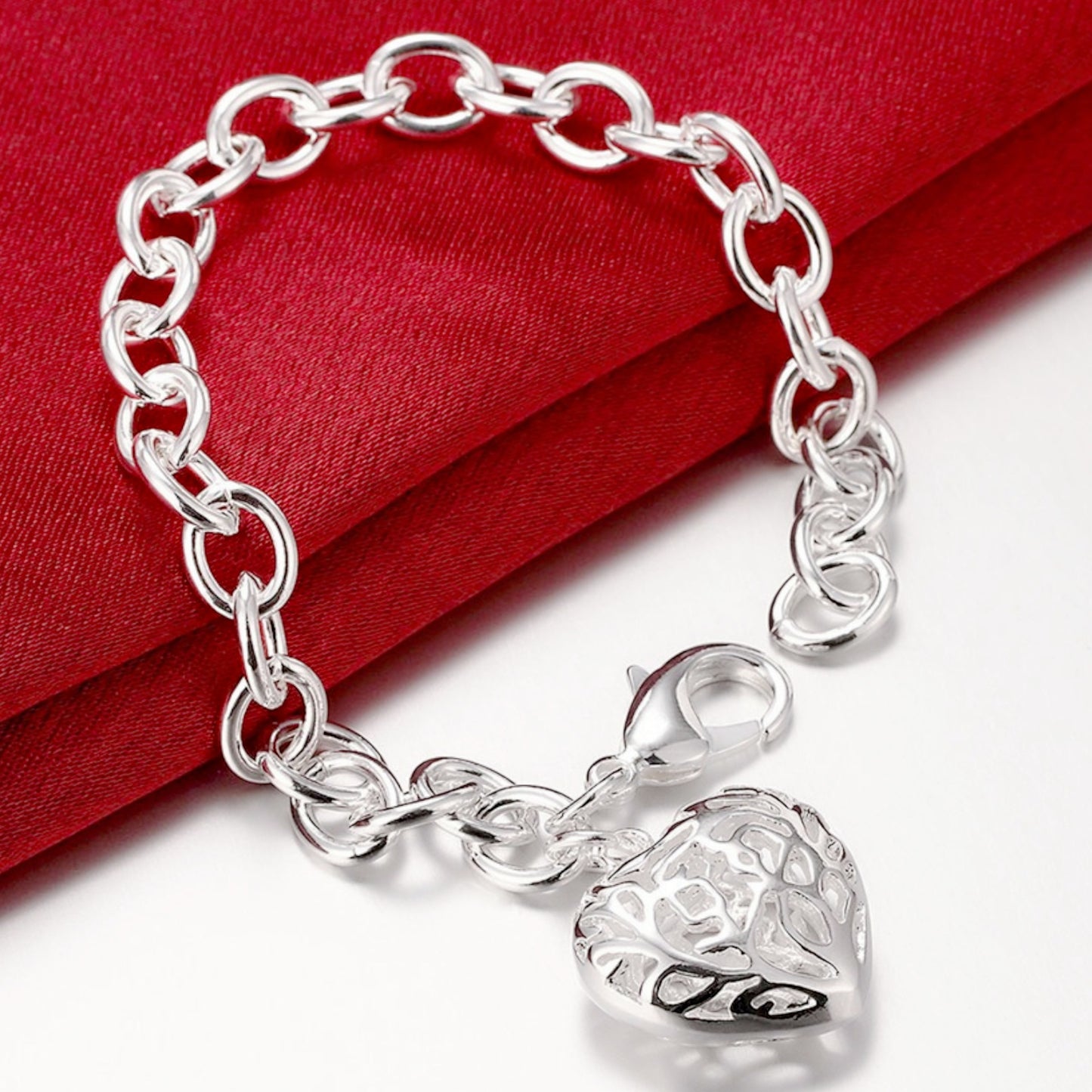 Pulsera de corazón hueco con hilo de plata 925