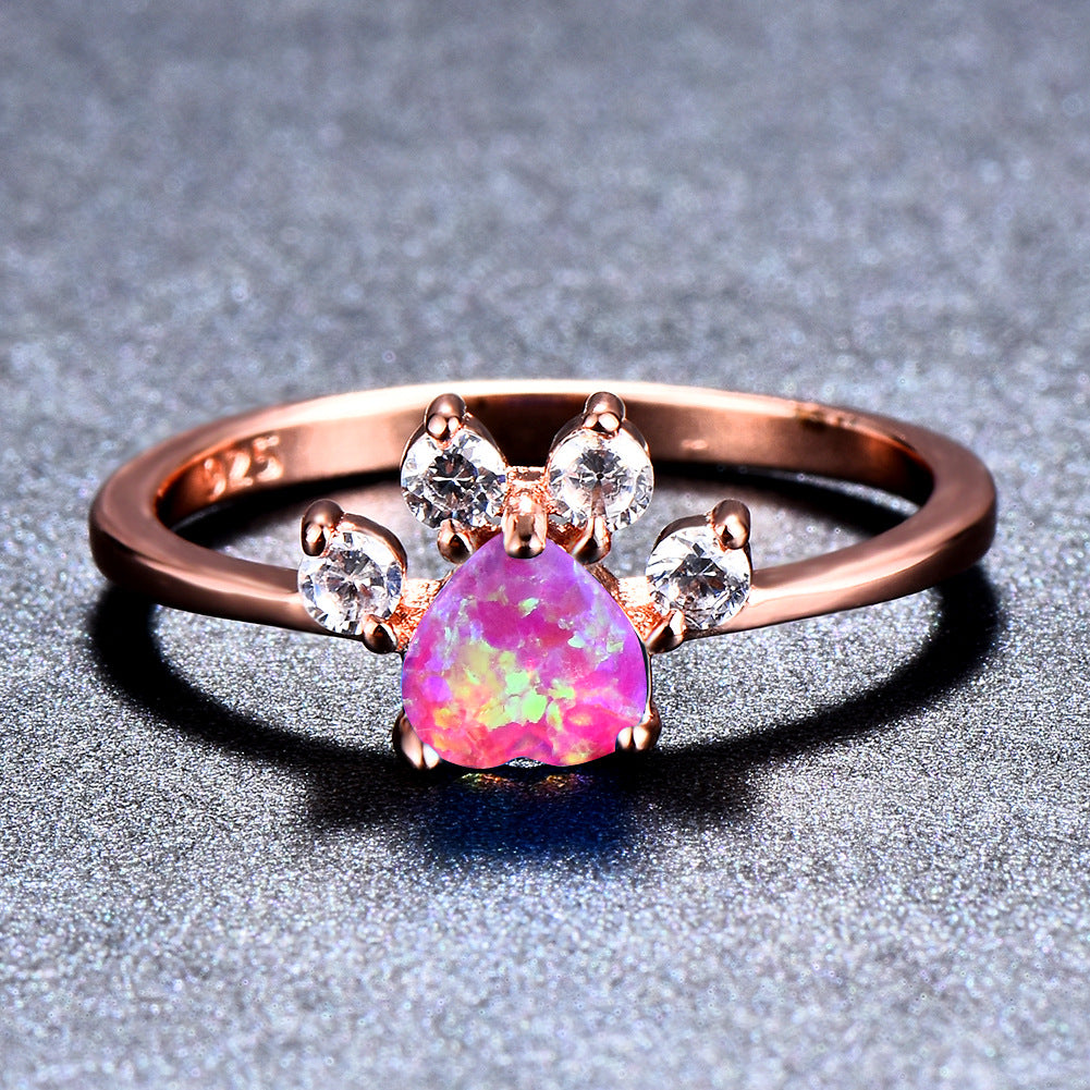 Anillo con huellas de ópalo en oro rosa y diseño personalizado