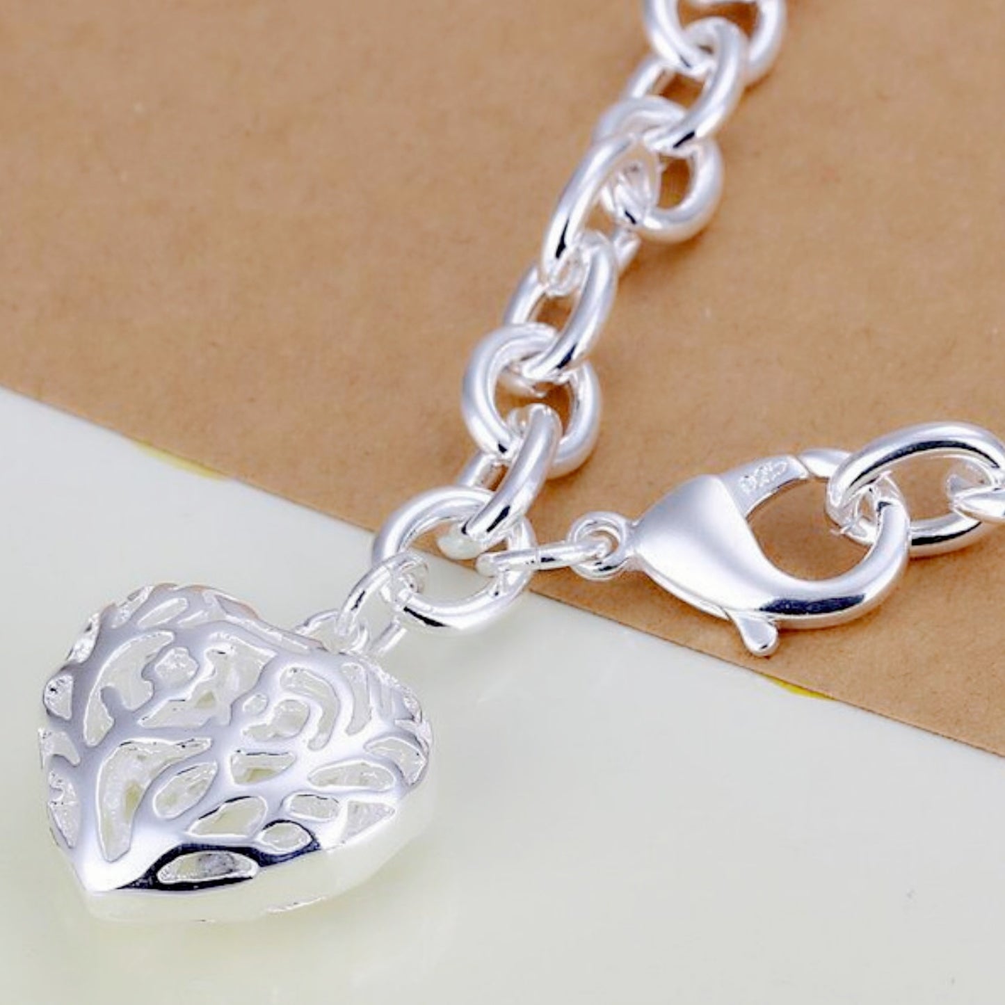 Pulsera de corazón hueco con hilo de plata 925